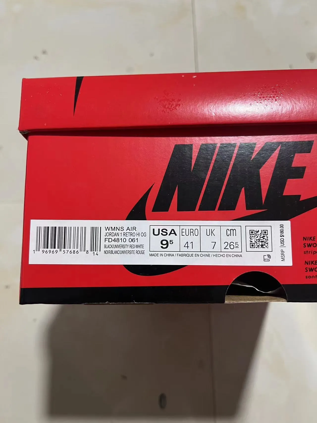 Tênis de basquete Air Jordan 1 High em cetim preto e vermelho 11