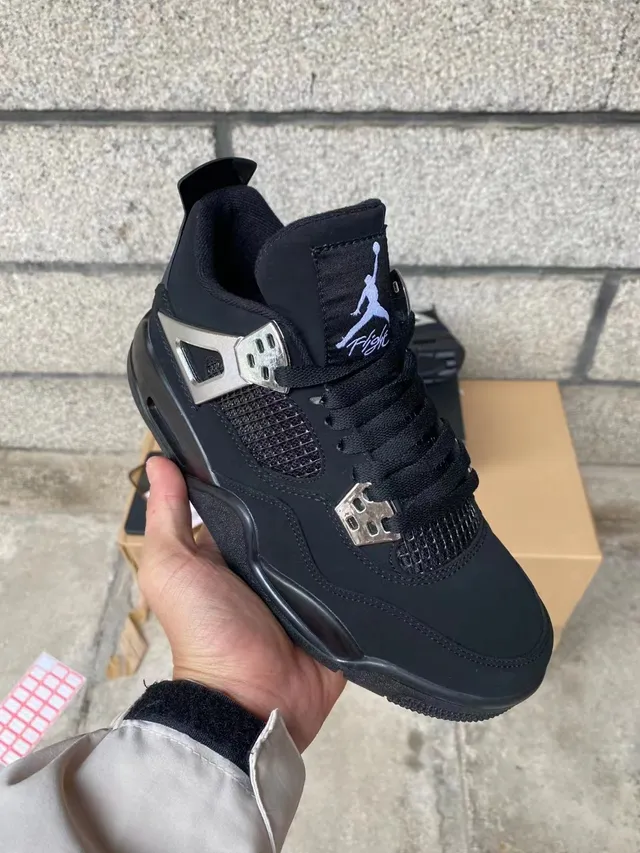 حذاء كرة السلة Air Jordan 4 باللونين الأسود والأخضر النيون 2
