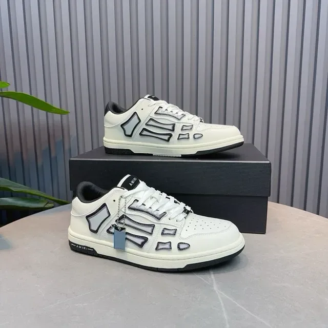 Amiri Skel Top Low Off-White y Negro Zapatillas Lifestyle 9