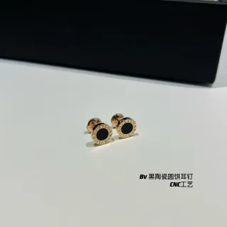 Bvlgari B.zero1 Pendientes de stud circulares en oro negro con logo grabado