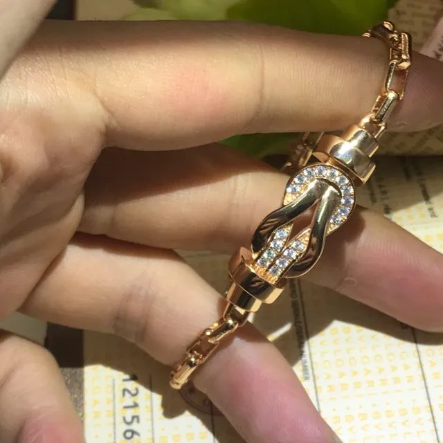 Bvlgari Icona Knot Pavé ক্রিস্টাল গোল্ড-টোন আঙটি 4