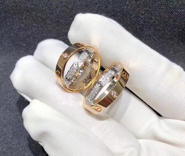 Anéis Cartier Love de dupla banda com motivo de parafuso pavimentados com diamantes em ouro de duas cores 3