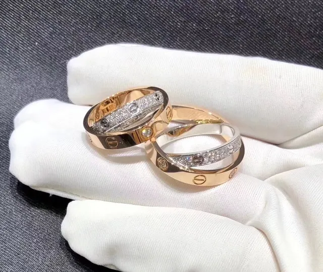 Anéis Cartier Love de dupla banda com motivo de parafuso pavimentados com diamantes em ouro de duas cores 4