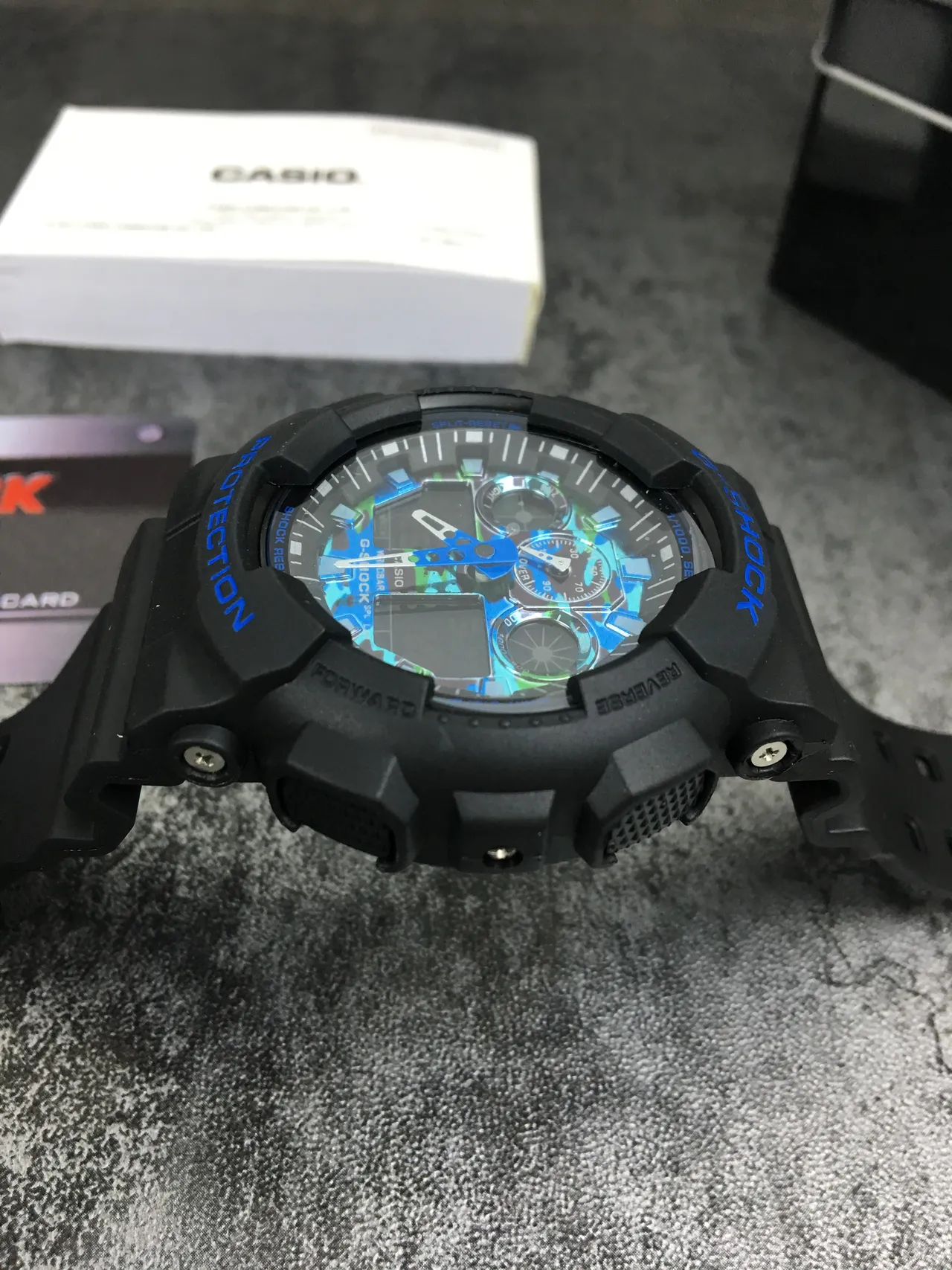 Casio G-Shock GA-100 Noir et Bleu Camo Montre Sport 4