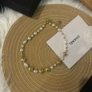 Chanel Pearl and Gold-Tone CC Logo Baroque Strand Necklace