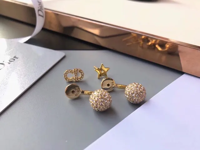 Dior Bobby and Rose des Vents aretes de tono dorado pavé de cristal 4