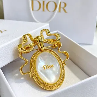 Dior सोने जैसी धनुष आकृति माँ-मोटी ब्रोच