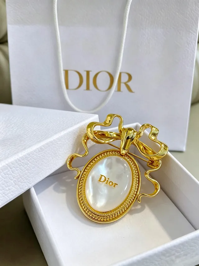 Dior सोने जैसी धनुष आकृति माँ-मोटी ब्रोच 4