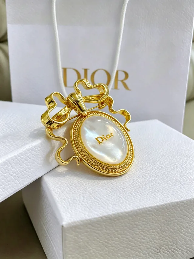 Dior सोने जैसी धनुष आकृति माँ-मोटी ब्रोच 5