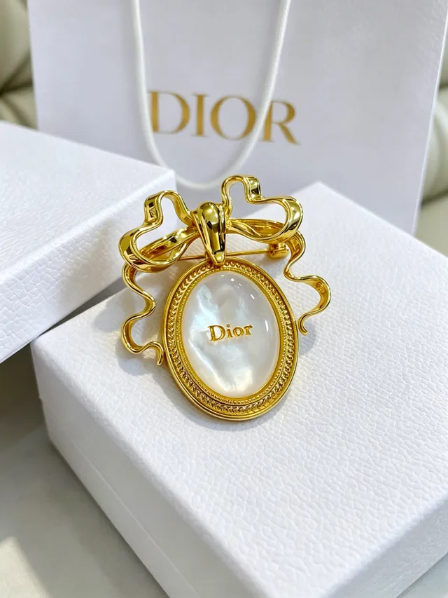 Dior सोने जैसी धनुष आकृति माँ-मोटी ब्रोच 7