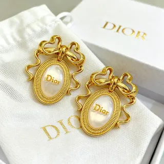Dior Boucles d'Oreilles Motif de Nœud Doré Ovale Cabochon