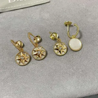 Dior Rose des Vents Boucles d'oreilles pendantes en nacre doré en forme d'étoile