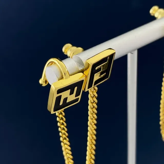 Fendi Gold Black Asymmetrical Chain-Connected Earrings 5