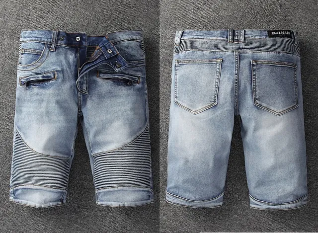 Shorts en denim bleu et noir distressed lavé moyen avec fermeture éclair et poches sur les cuisses 14