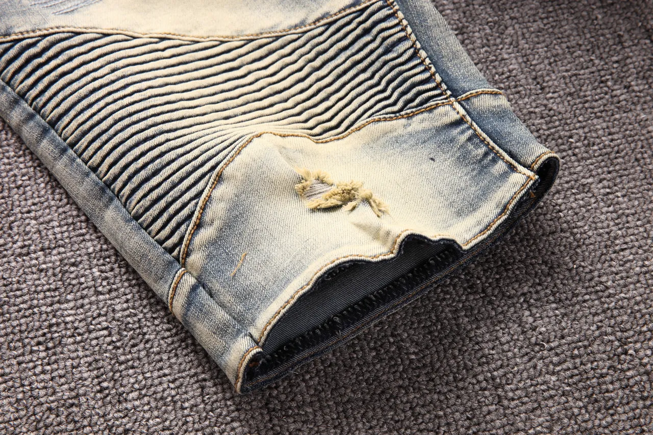 بناطيل قصيرة من الدنيم distressed panelled حتى الركبة مع جيوب سحاب 7