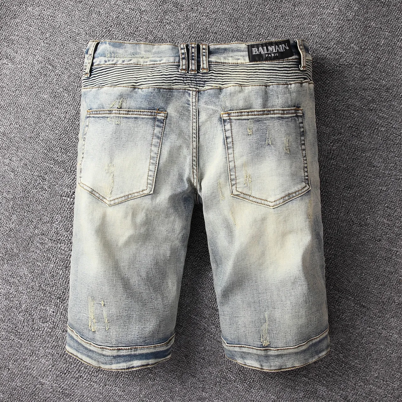 بناطيل قصيرة من الدنيم distressed panelled حتى الركبة مع جيوب سحاب 14