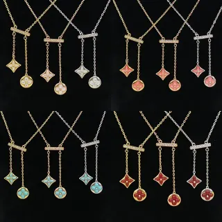 Collier avec pendentif double dangle en or et argent motifs floraux émaillés