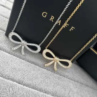 Collier Graff Bow pendentif or argent avec pierres pavé