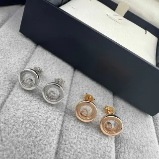 أقراط أذن فضية وذهب وردي مع قرص دوار