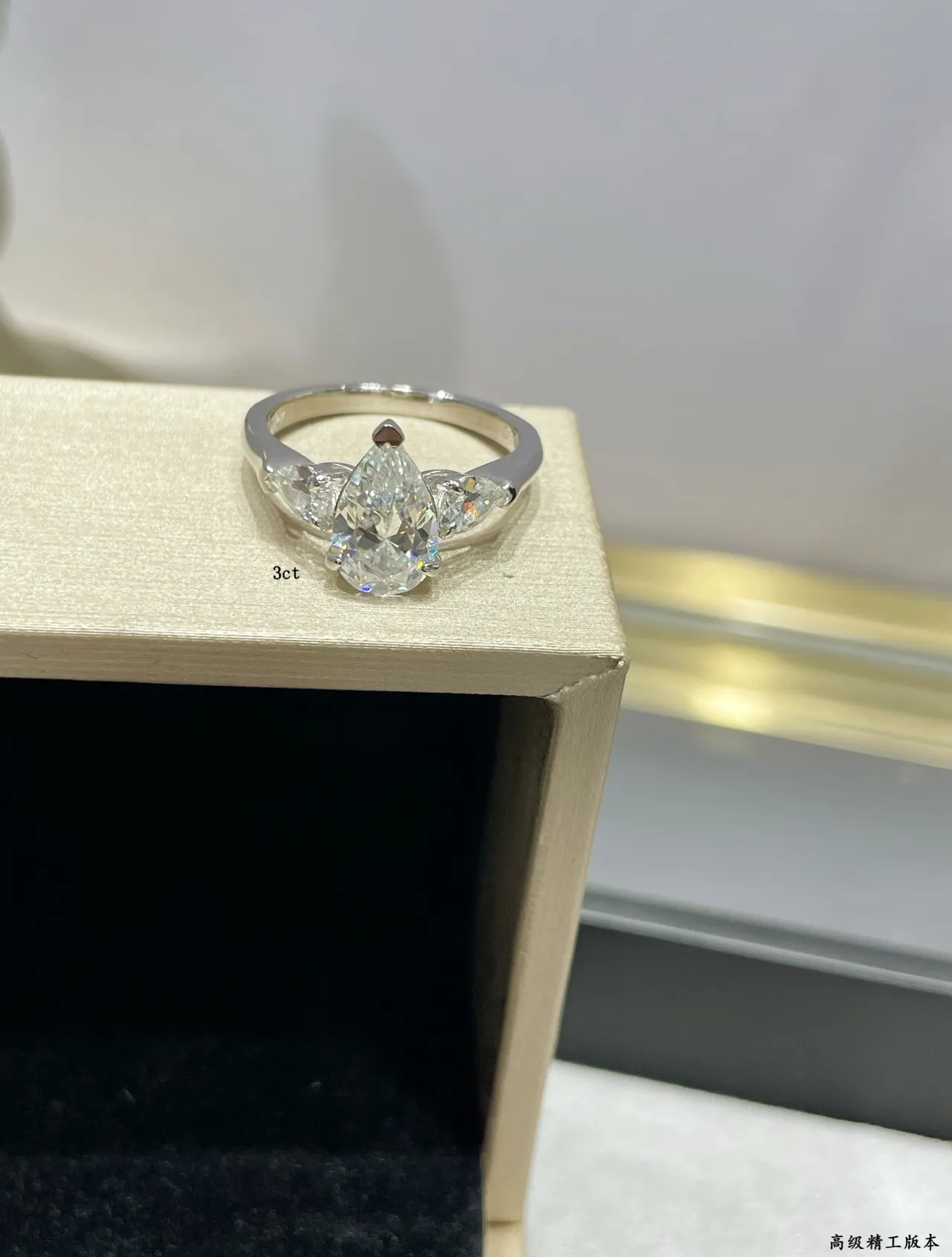 Silver Pear-Cut Center Stone Tapered Side Stones Ring 6