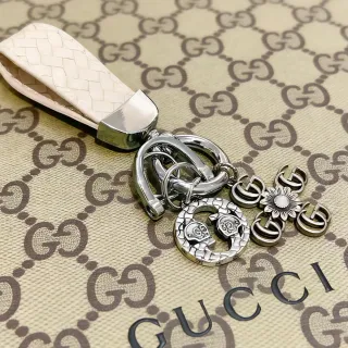 Gucci Beige Silver Woven Leather Polished Metal Handbag