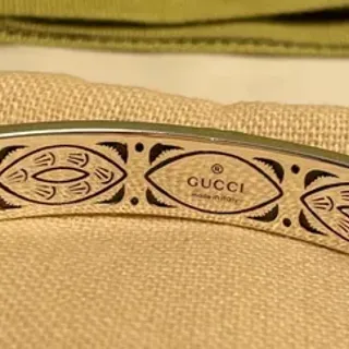 Gucci نقشة العين منقوشة سوار باللون الذهبي