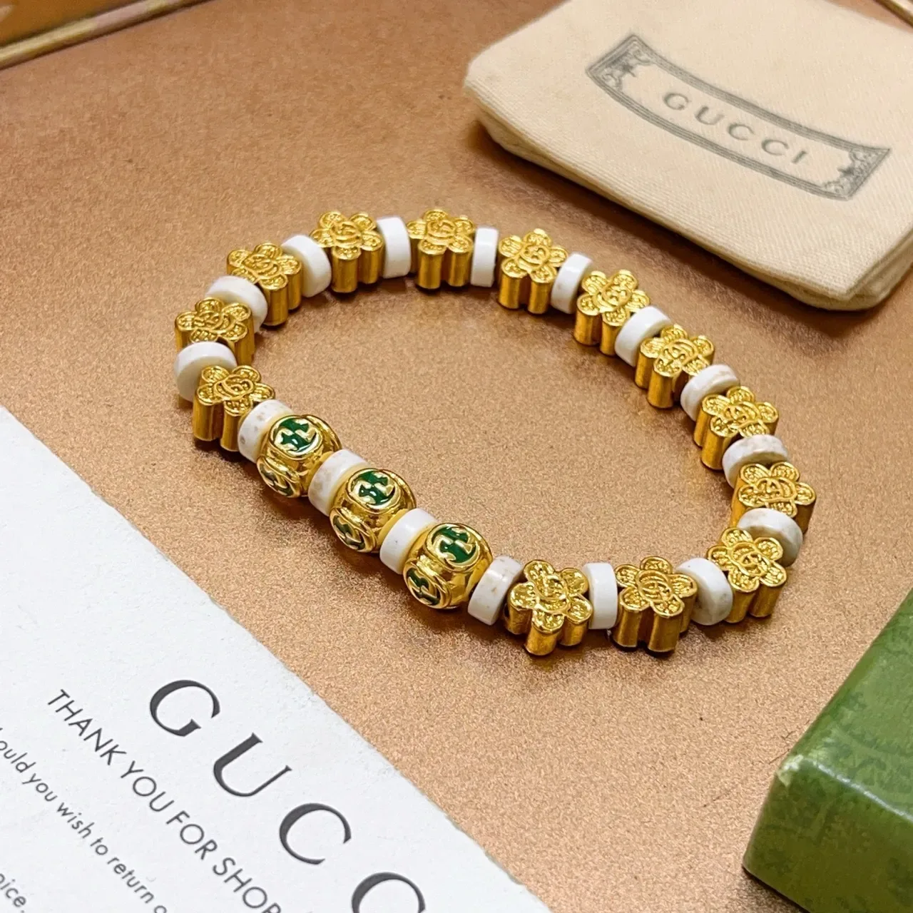 Gucci GG سوار خرز ذهبي أخضر معدني حجر أبيض 2