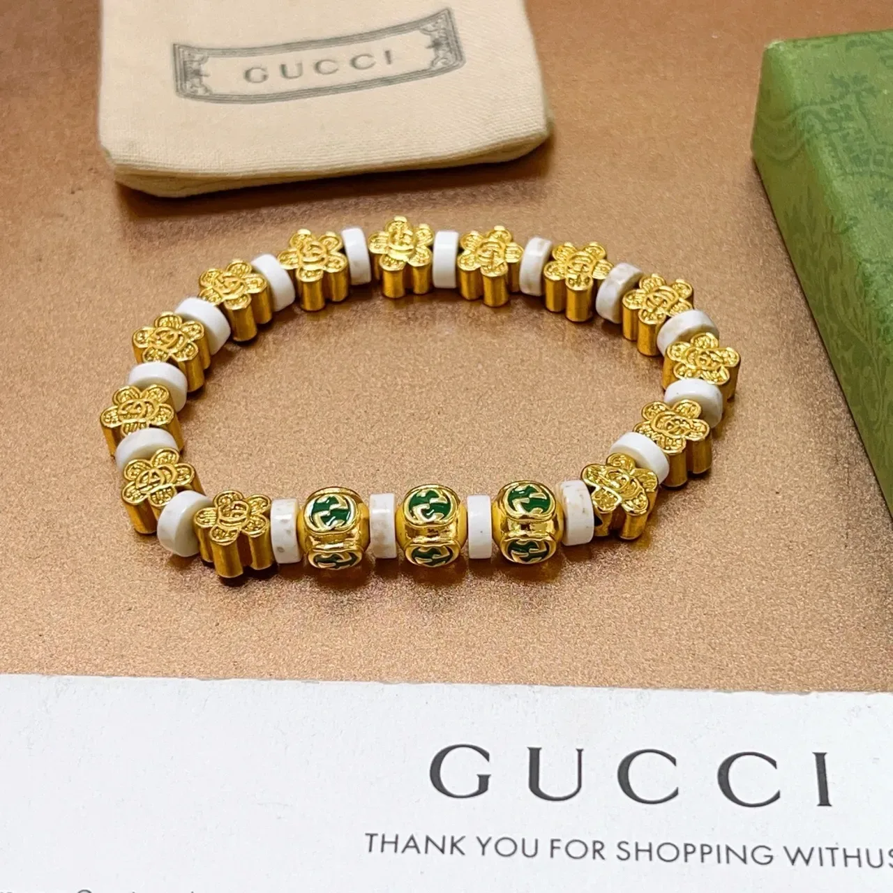 Gucci GG سوار خرز ذهبي أخضر معدني حجر أبيض 6
