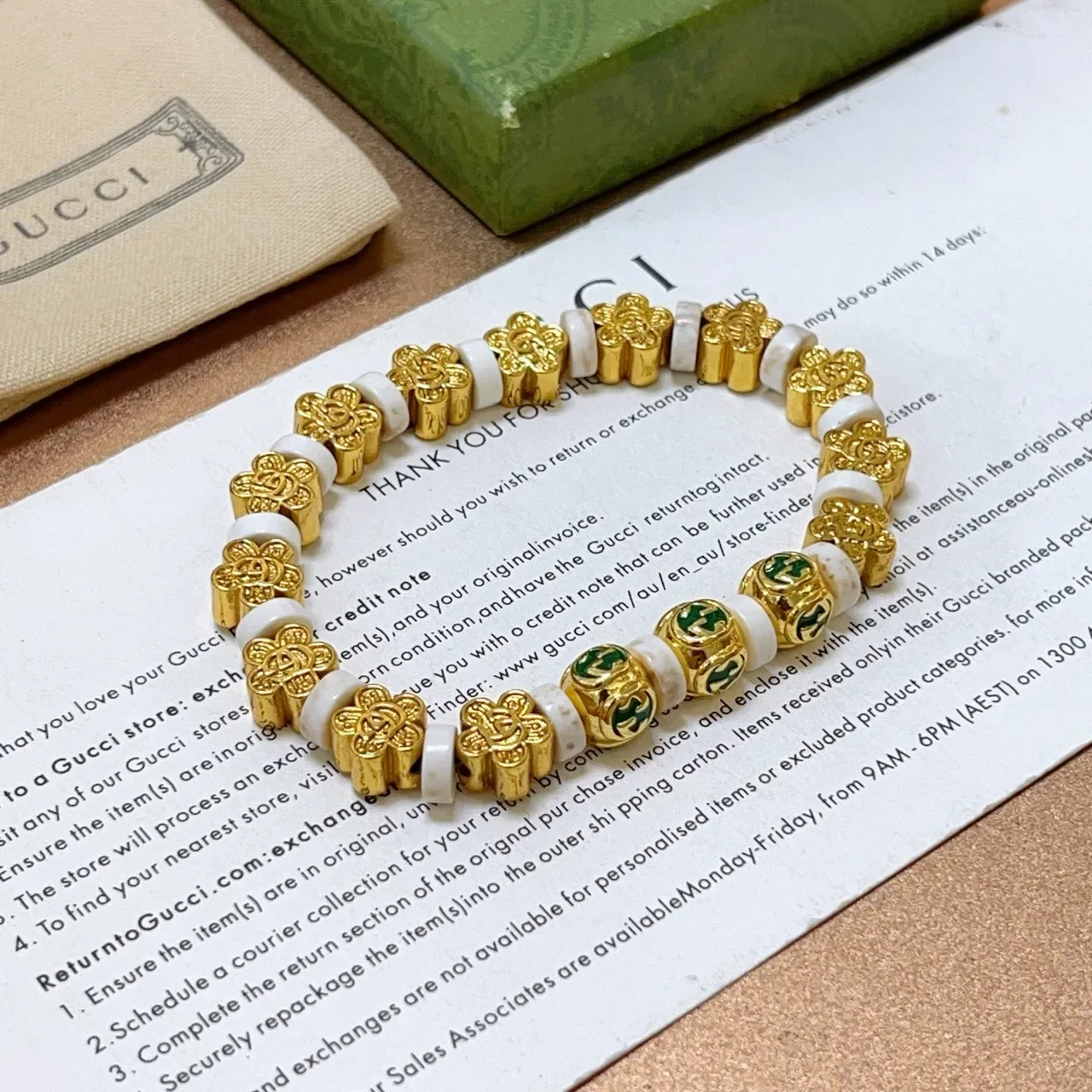 Gucci GG سوار خرز ذهبي أخضر معدني حجر أبيض 8
