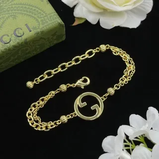 Gucci GG Marmont سوار معلق ذهبي سلاسل مزدوجة G متشابك