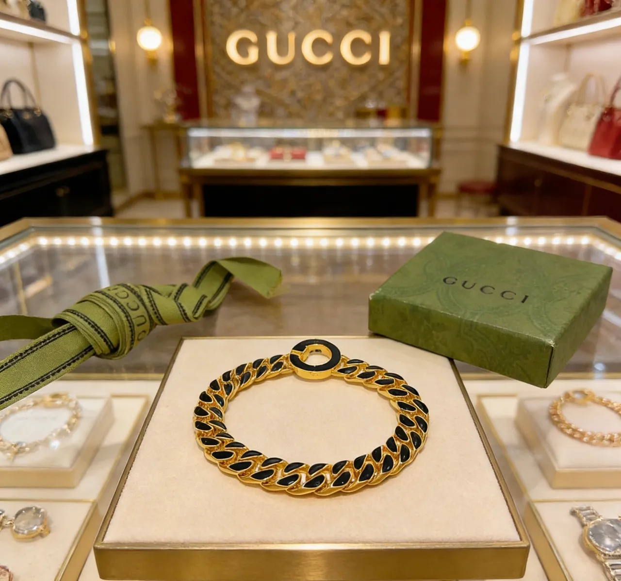Gucci GG Marmont سوار بلون ذهبي وأسود مينا سلسلة كرب 6