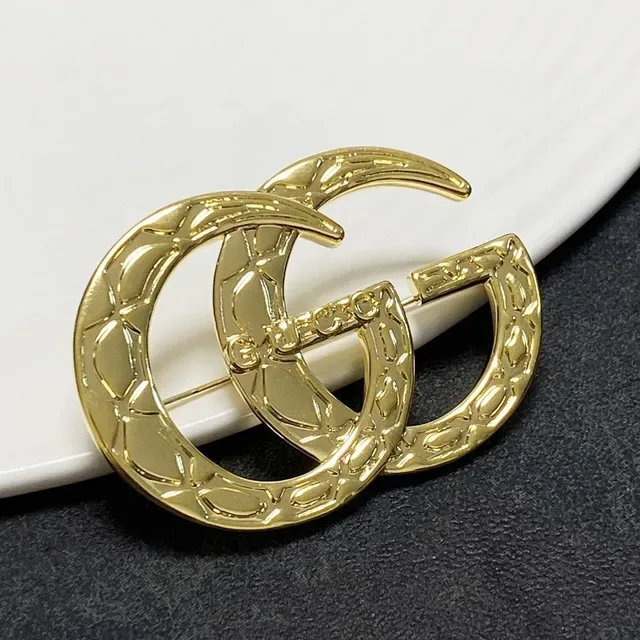 Gucci GG Marmont Quilted Gold-Tone Interlocking G Brooch 4