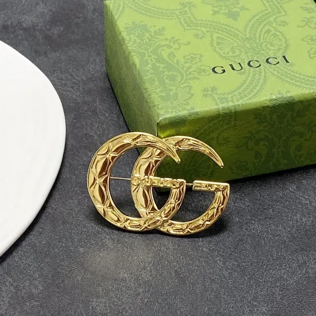 Gucci GG Marmont Quilted Gold-Tone Interlocking G Brooch 6