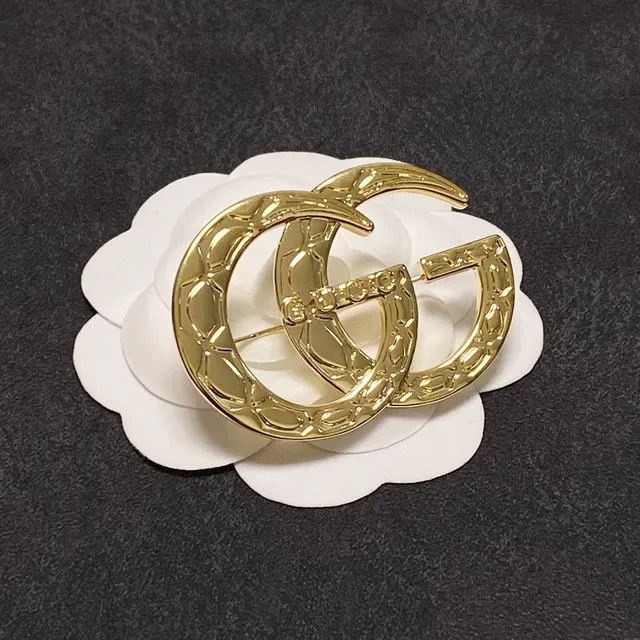 Gucci GG Marmont Quilted Gold-Tone Interlocking G Brooch 7