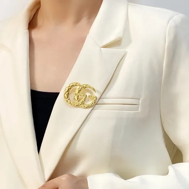 Gucci GG Marmont Quilted Gold-Tone Interlocking G Brooch 8