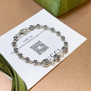 سوار Gucci GG Marmont فضي أسود Interlocking G Logo Links من المعدن