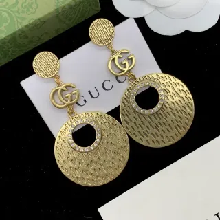 Gucci أقراط ذهبي وفضي ديسك مُنقَّش