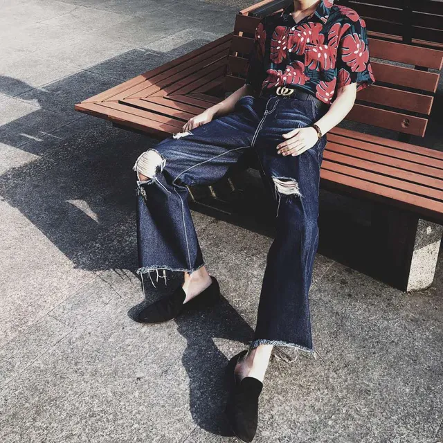 Gucci calças jeans de perna larga desgastadas com barra crua 2