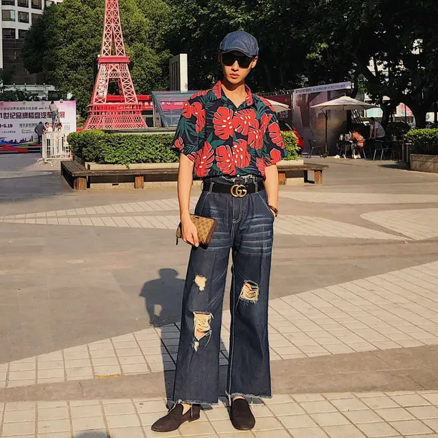 Gucci calças jeans de perna larga desgastadas com barra crua 4