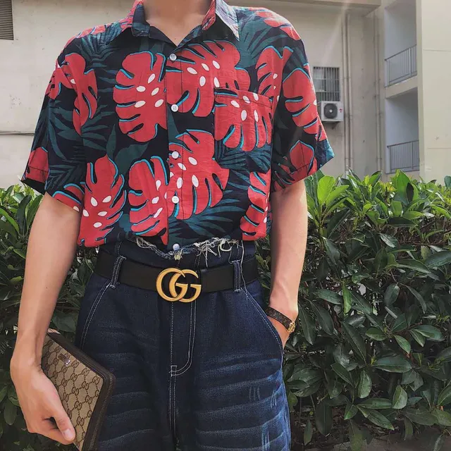 Gucci calças jeans de perna larga desgastadas com barra crua 5