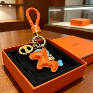 Hermès Orange Blue Braided Leather Loop Horse-Shaped Charm Phone Case