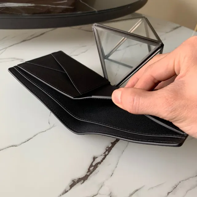 Louis Vuitton কালো পেবল লেদার এমবসড মনোগ্রাম সংক্ষিপ্ত ওয়ালেট 3