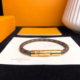 Louis Vuitton سوار Monogram بني ذهب قماش قفل أسطواني سوار