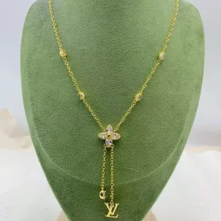 Colar com pingente de flor Louis Vuitton tom dourado com cristais