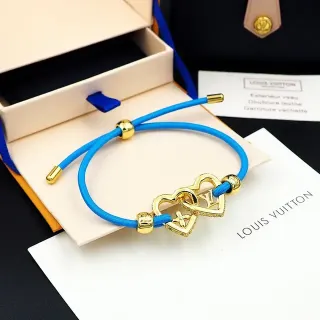 Louis Vuitton corazones entrelazados tono dorado cuerda azul pulsera