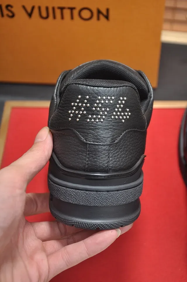 Louis Vuitton LV Trainer Black Gold Pebbled Leather Upper Layered Rubber Midsole Lifestyle Sneakers 2