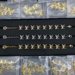 سوارات لويس فيتون مونوغرام بيت كريستال ذهبي فضي