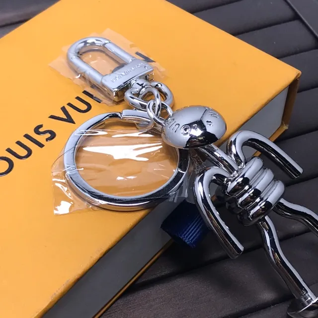 Louis Vuitton Figure de bâton Bleu argent Métal chrome poli Articulé Silhouette Accessoire téléphone 2
