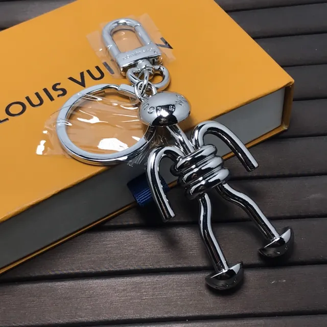Louis Vuitton Figure de bâton Bleu argent Métal chrome poli Articulé Silhouette Accessoire téléphone 3