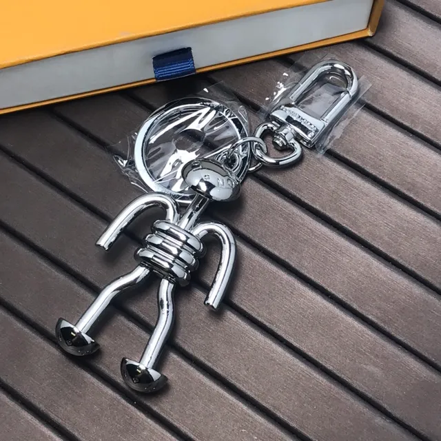 Louis Vuitton Figure de bâton Bleu argent Métal chrome poli Articulé Silhouette Accessoire téléphone 4